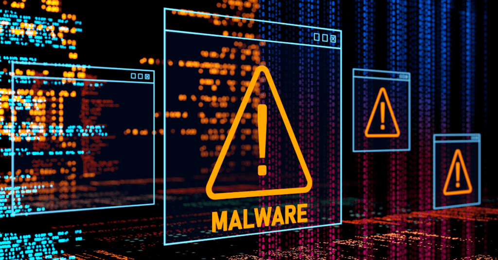 A computer screen displaying a warning sign for malware infection.